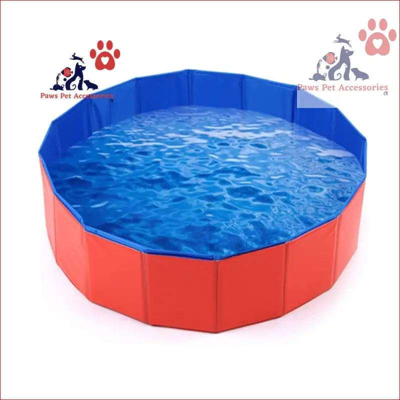 Red collapsible outdoor bathing pool full of blue water for playful pets