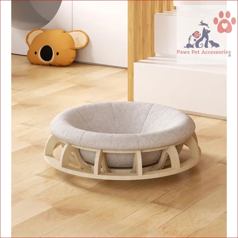 Round cushioned Timber Gyro Cat Nest Bed with modern slatted base and scratch resistance