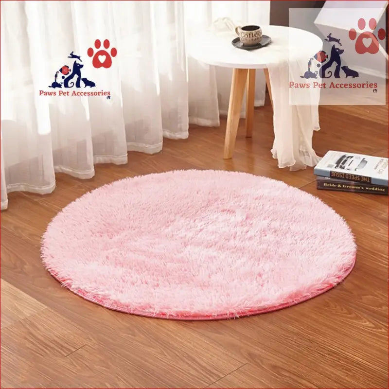 Soft pink circular shag rug for a cozy heated pet bed that saves energy and keeps pets warm