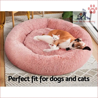 Pink circular plush pet bed dog cat 110cm with a cat and dog resting together