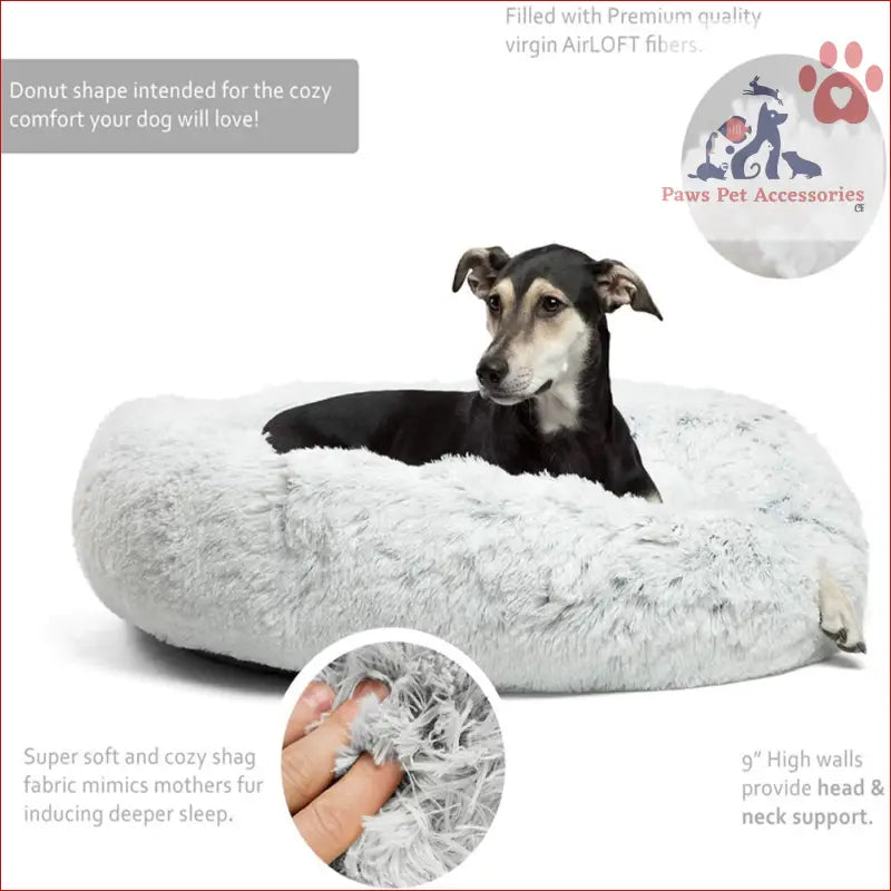 Black dog snuggled in a fluffy Machine Washable Calming Donut Pet Bed for comfort