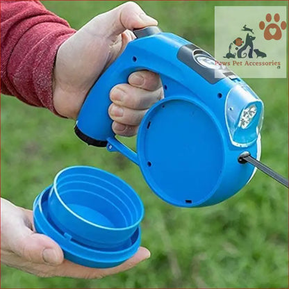 Bright blue multifunctional retractable leash with water bowl and LED walking rope feature