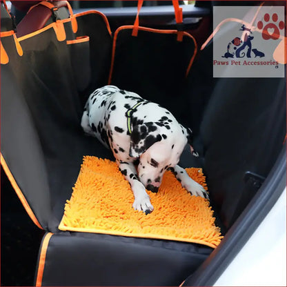 Dalmatian dog relaxing on orange blanket with PETSWOL Dog Car Seat Cover and Snuffle Mat