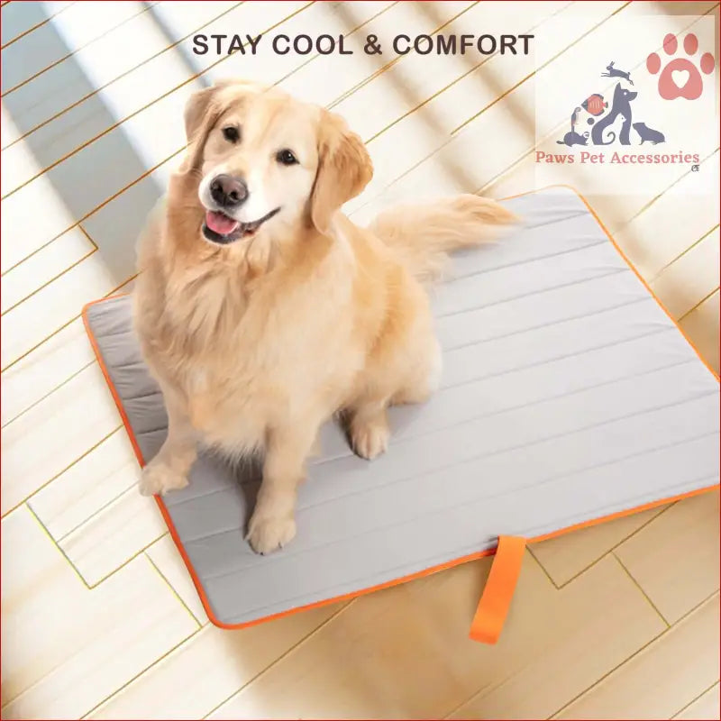 Happy Golden Retriever relaxing on a dog cooling mat for travel and outdoor use