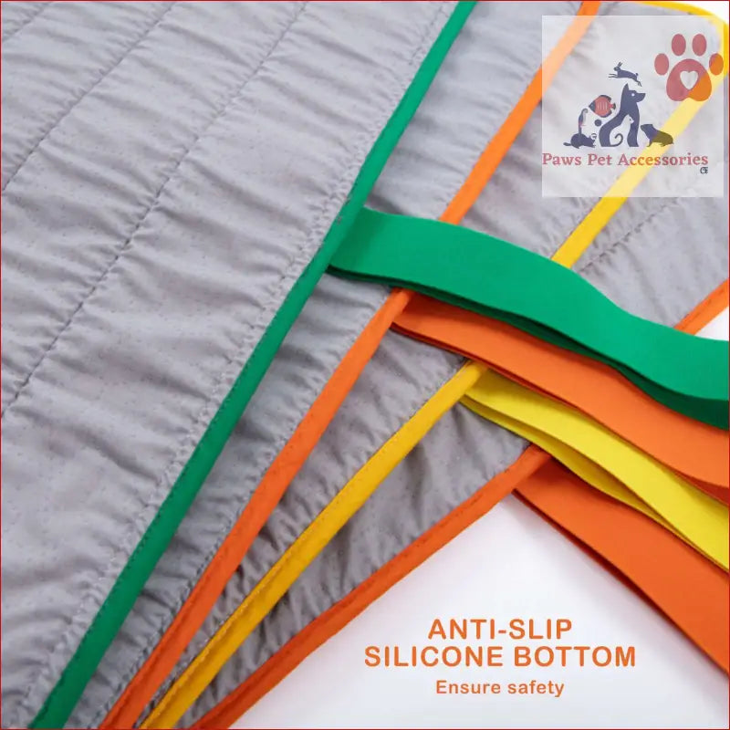 Colorful silicone straps on a quilted gray fabric for a Pet Dog Cooling Mat Travel Roll