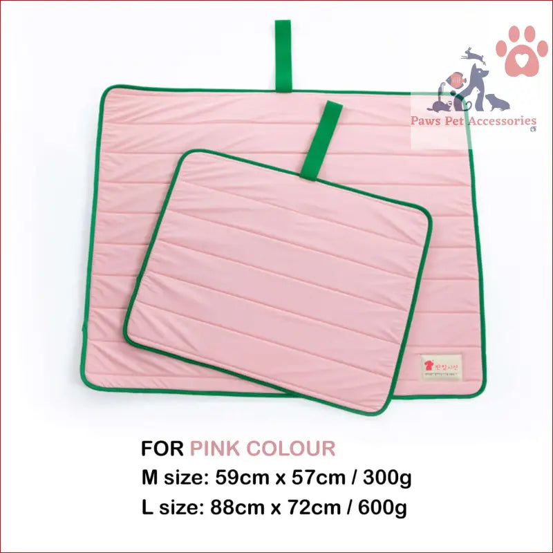 Pink dog cooling mat with green trim and loops, perfect travel roll up cool pad bed