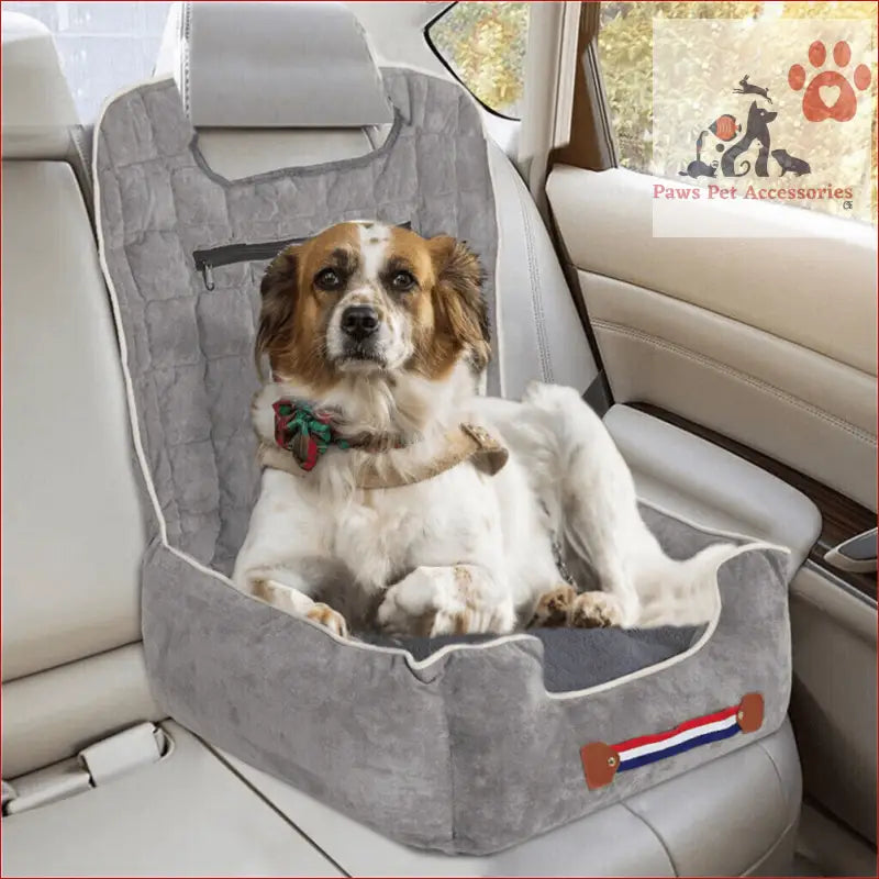 Dog in a bow tie relaxing in an anti-slip pet booster seat with safety leash