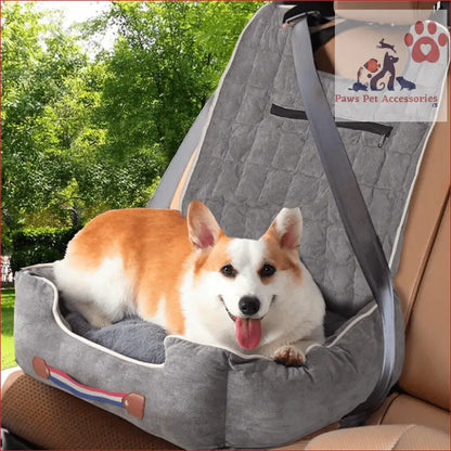 Corgi chilling in an anti-slip pet booster seat with safety leash and storage pockets