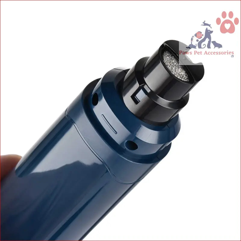 Navy blue vape device with black mouthpiece beside the Pet Nail Grinder for dogs and cats