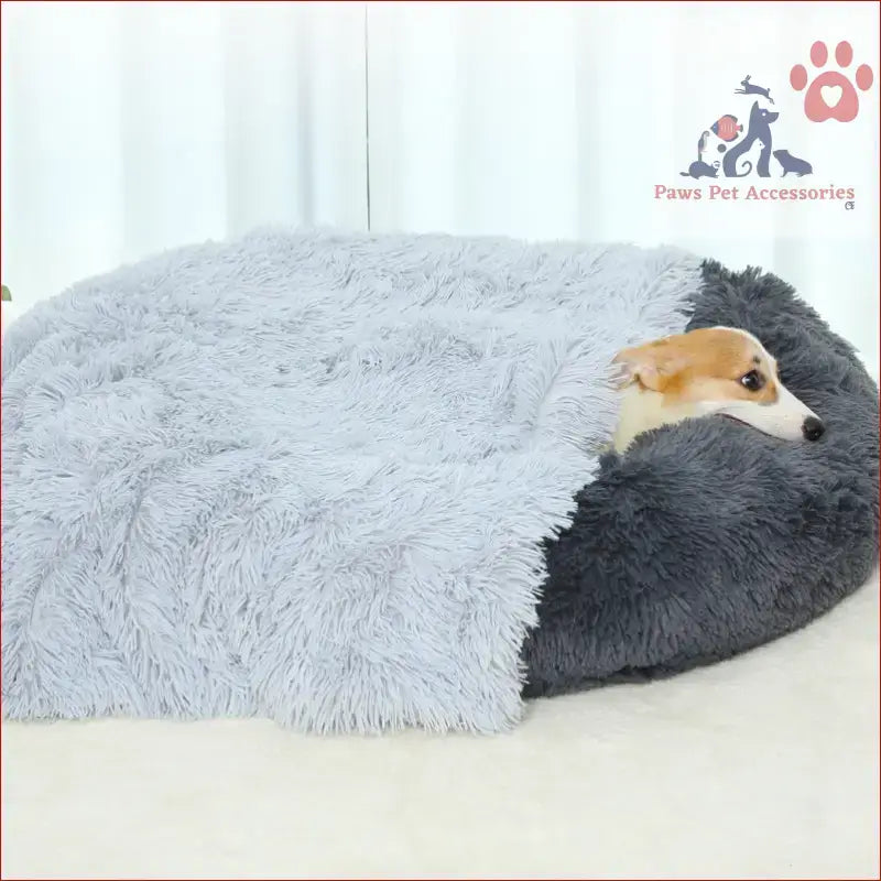 Fluffy gray and black pet bed with a small dog, perfect for anti-anxiety cozy throws