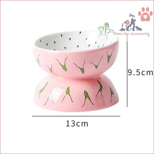 Pink ceramic elevated pet food bowl with cute Pitaya pattern and green leaf design