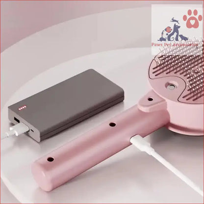 Pink electric Massage Brush with power bank for easy pet grooming and one-click hair removal