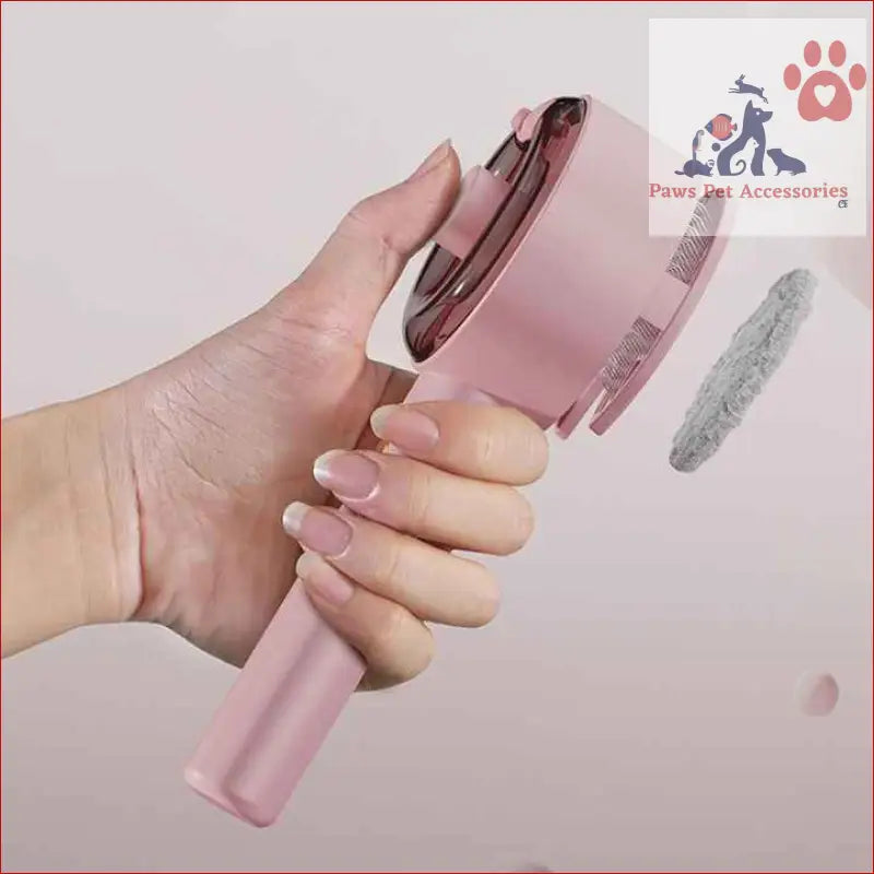 Pink handheld portable fan with detachable cover next to Pet Grooming Spray and Massage Brush