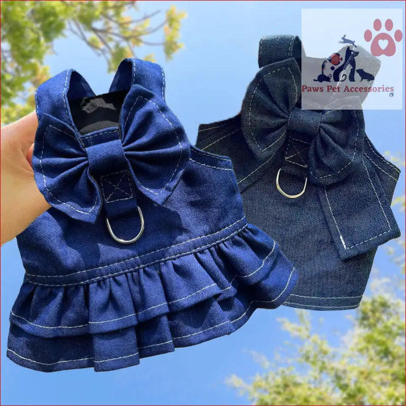 Two stylish Denim Harness Dresses for pets, featuring bows and a handy leash ring