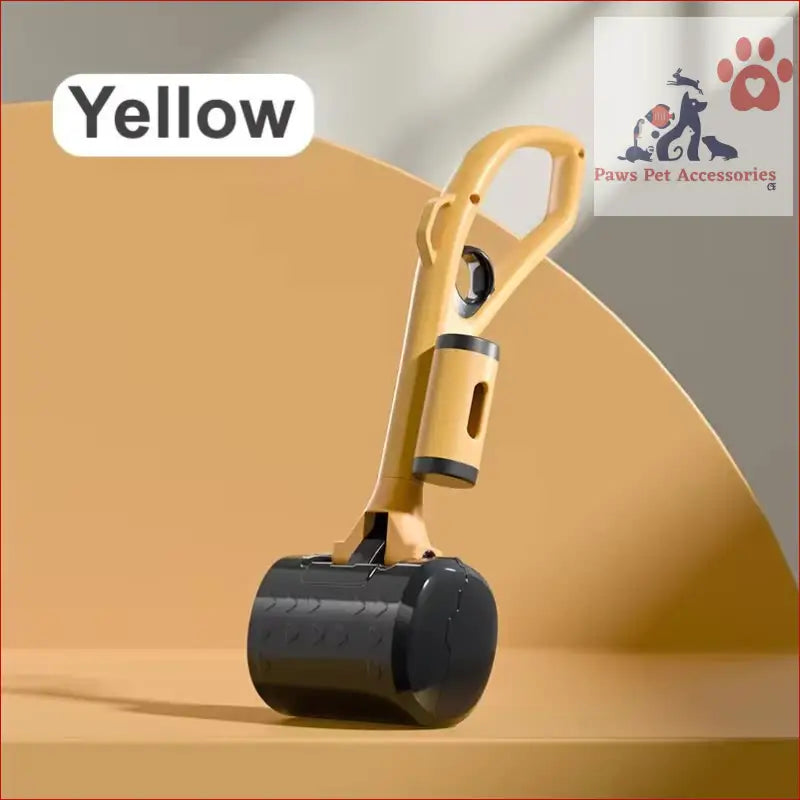 Yellow hammer design on a portable dog poop scooper with ergonomic handle for easy use