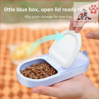 Light blue portable pet food container with hinged lid and 90g capacity for travel-friendly feeding