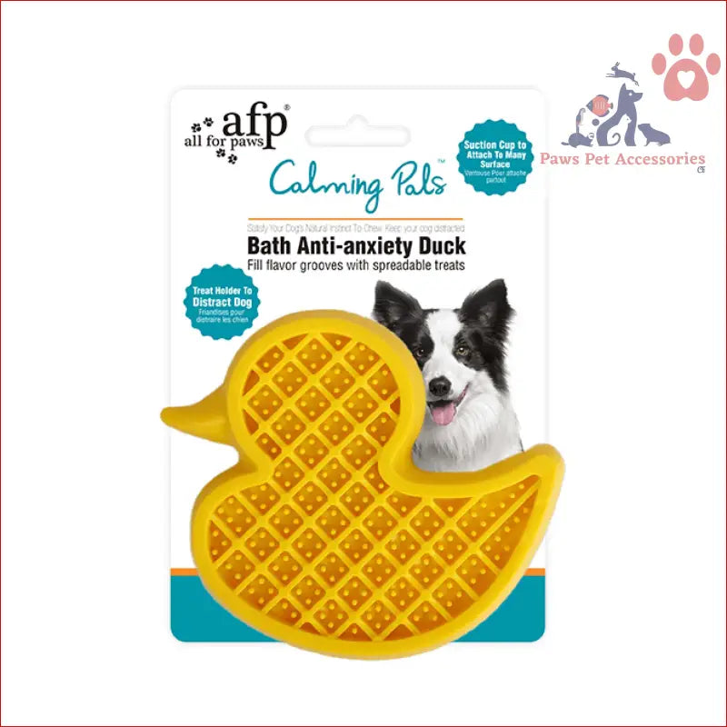 Yellow rubber duck dog bath time toy with grooves for treats, great calming lick mat