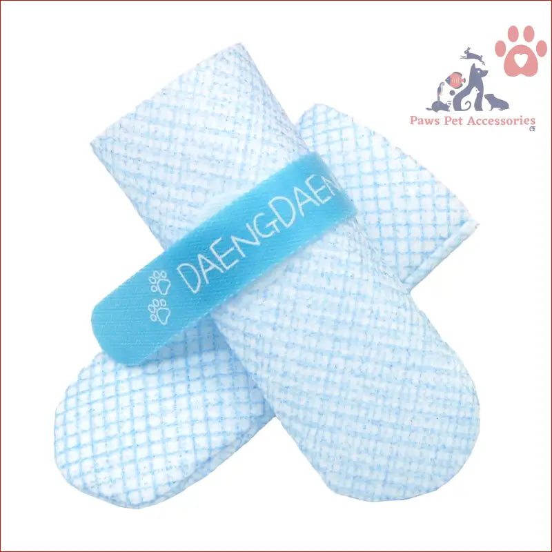 Blue adhesive bandage on white gauze for waterproof disposable boots for dogs